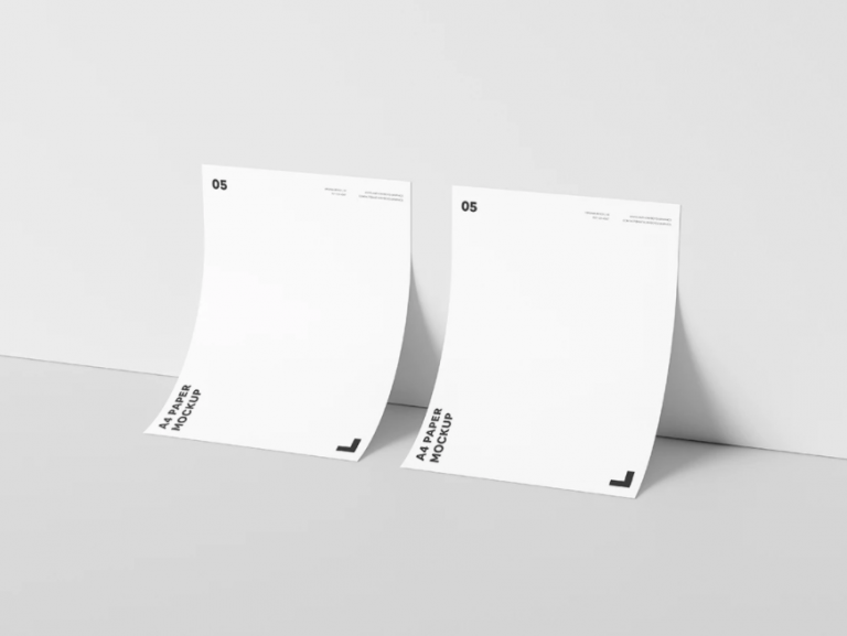 Mockup tờ rơi A4 đặt cạnh tường