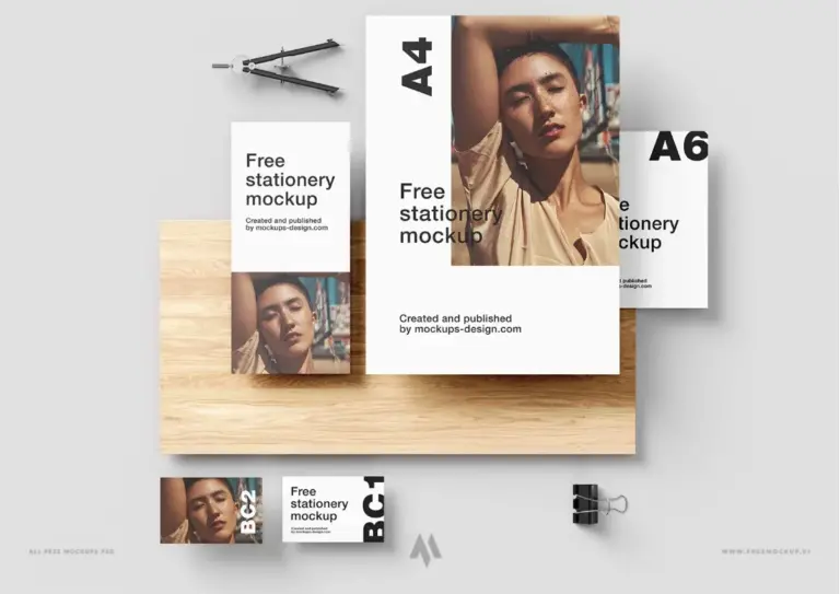 Mockup bộ nhận diện thương hiệu đặt cạnh tấm gỗ