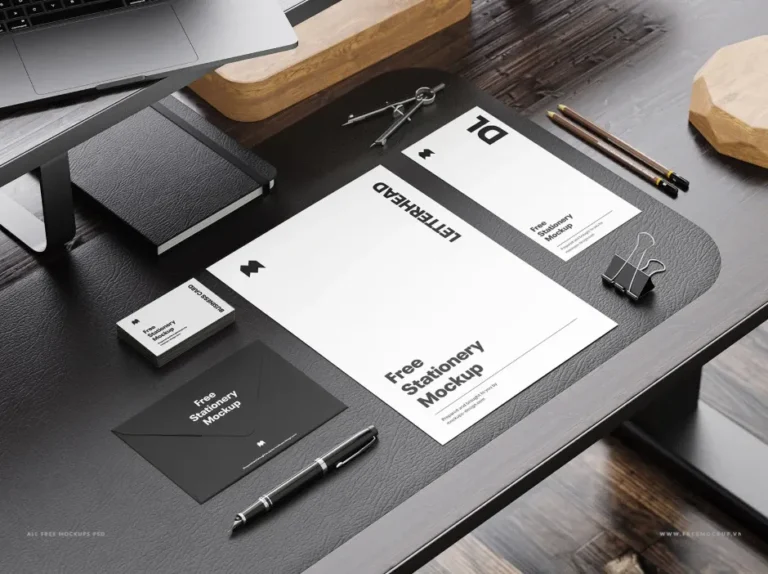 Mockup bộ nhận diện thương hiệu đặt trên bàn
