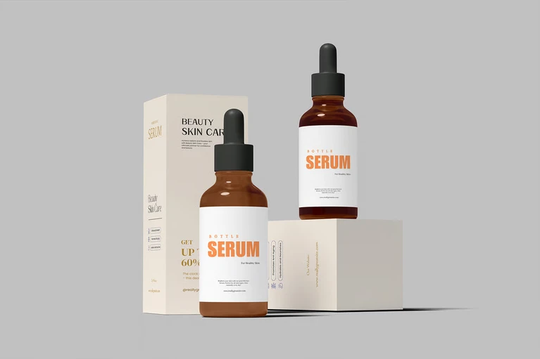 Mockup chai serum và hộp bao bì PSD